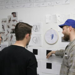 students talking about work